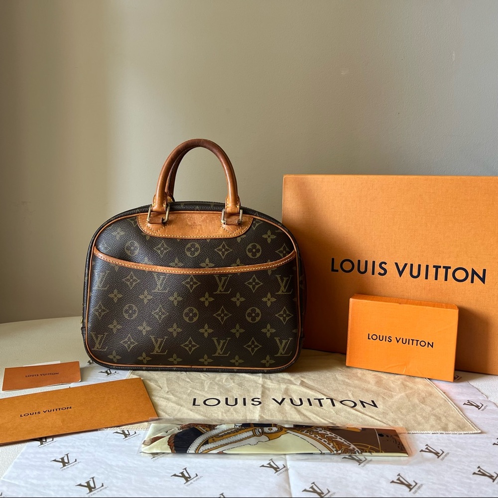 Louis Vuitton - Trouville Dust Twilly Bag